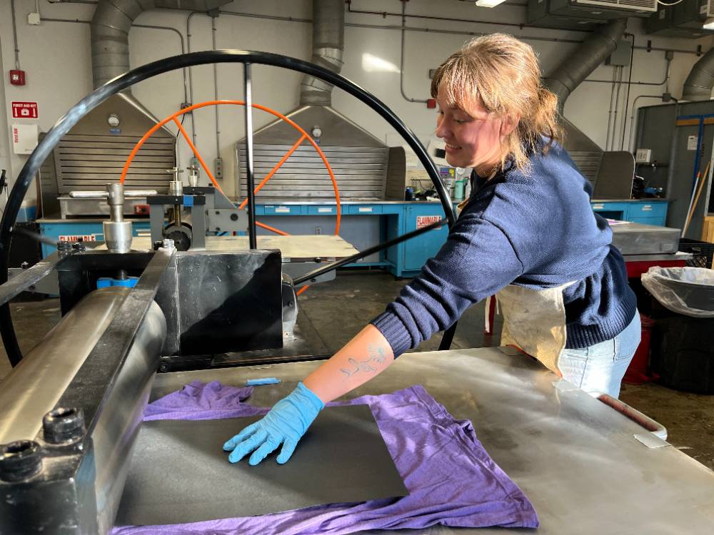 Alexa Murry Printing a linoblock on a t-shirt